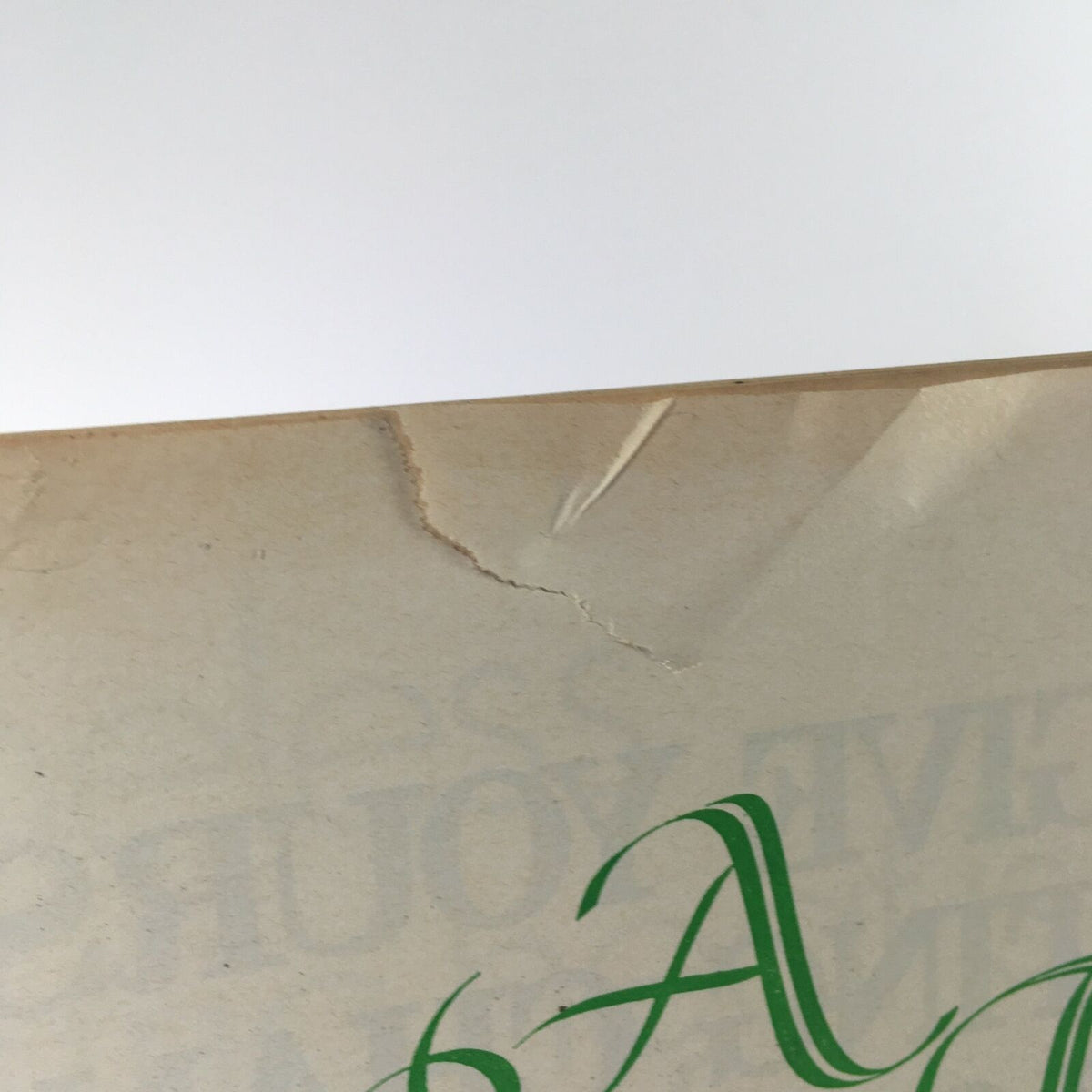 Close-up of the corner of a vintage Life Magazine from December 25, 1970, showing a crease and minor wear, highlighting the magazine's vintage condition.