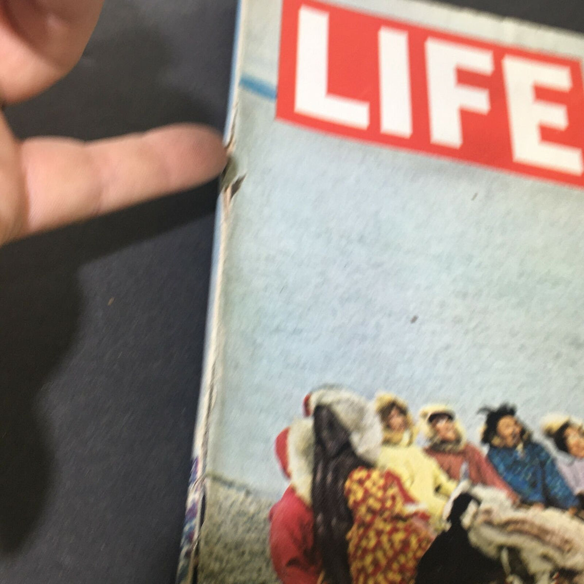 Detail of VTG Life Magazine October 1 1965 showing the wear on the cover edge, emphasizing the magazine's vintage character.