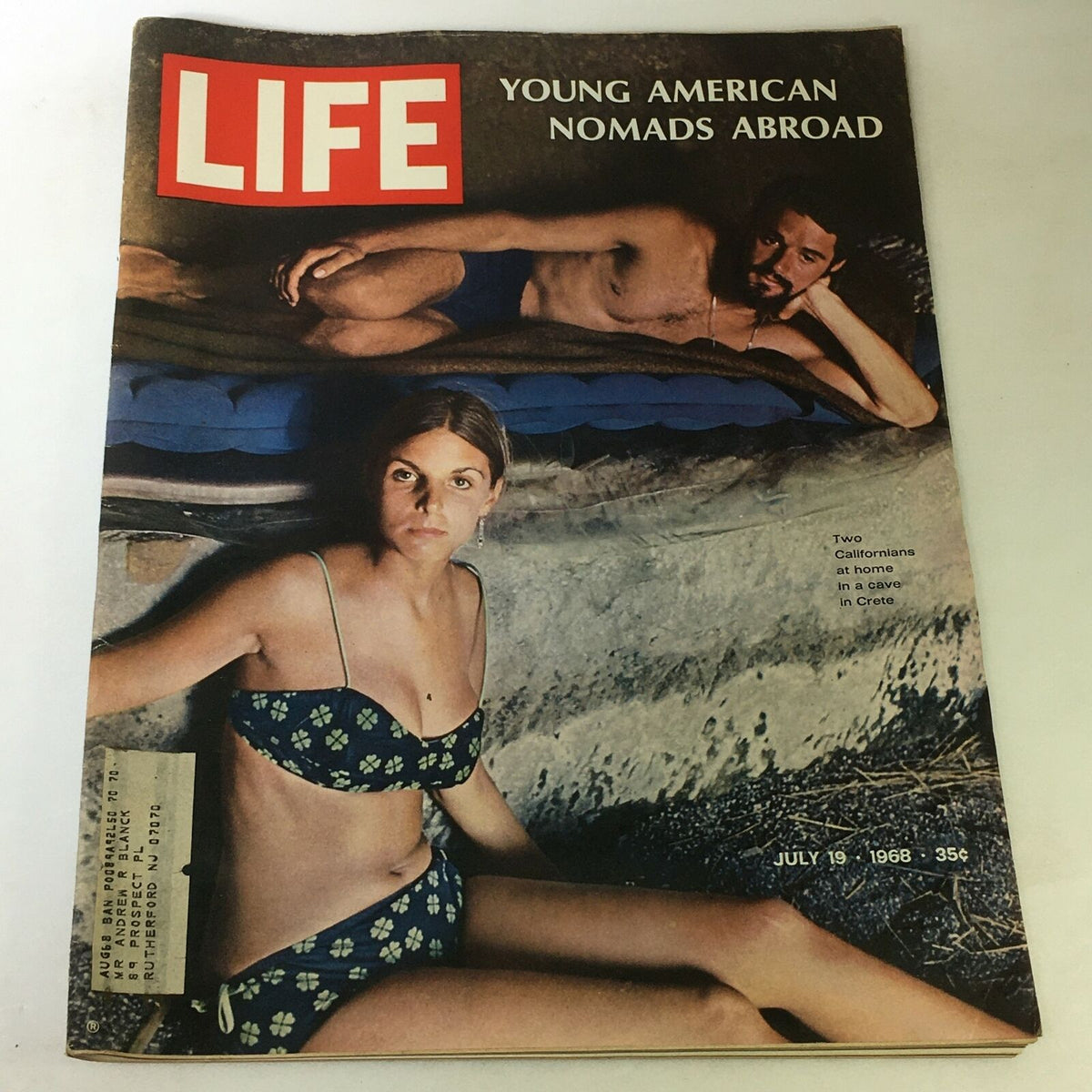 Cover of VTG Life Magazine from July 19, 1968, featuring 'Young American Nomads Abroad' with two Californians in a cave in Crete, showcasing a vintage travel theme of the 1960s.