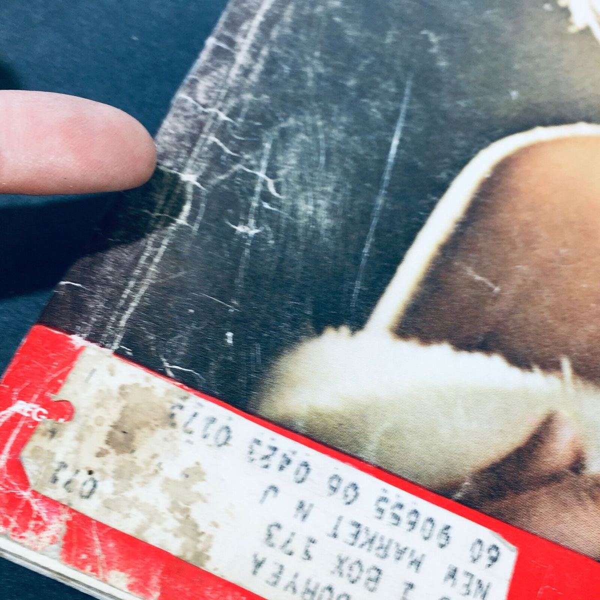 Detailed view of the corner of 'VTG Life Magazine November 28 1960 - Carroll Baker Baby Doll Grows Up', highlighting aging and an address label.