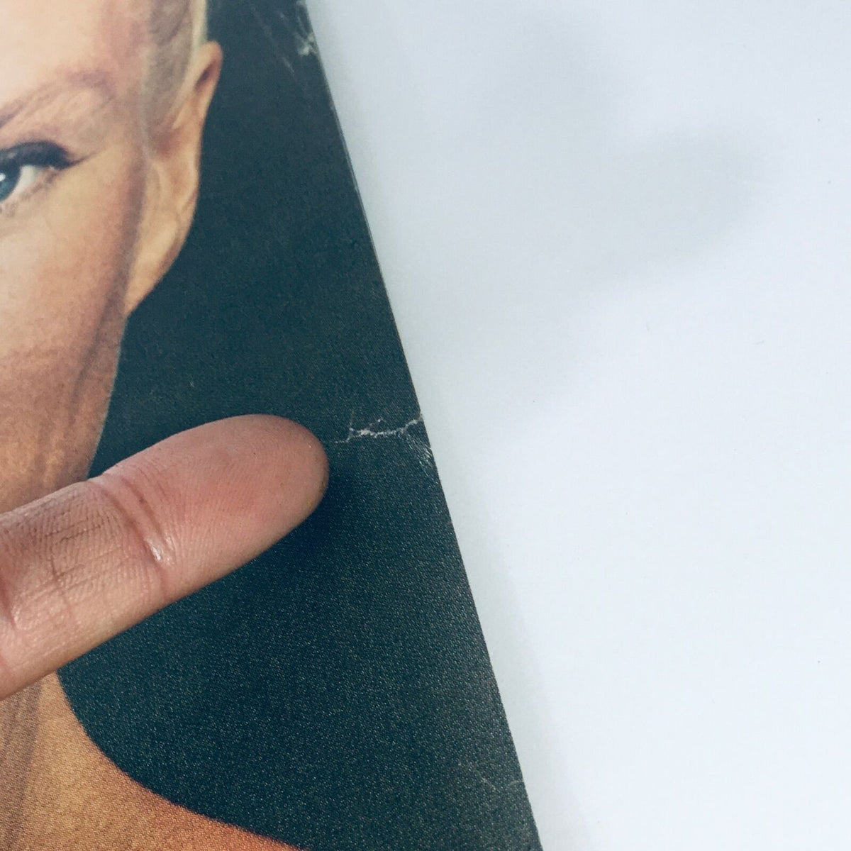 Detail view of a minor crease on the edge of the cover of VTG Life Magazine February 11 1972, emphasizing the wear from age while maintaining overall good condition.