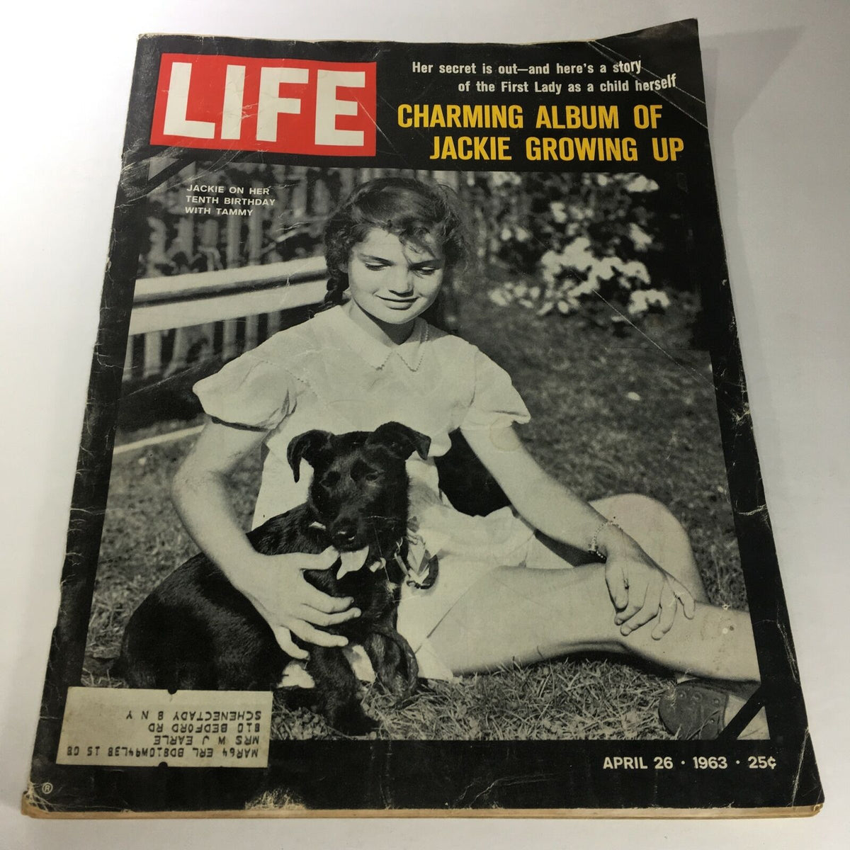 VTG Life Magazine: April 26 1963 - Jackie Kennedy On Her 10th Birthday, showcasing a young girl with a dog, featuring a vintage cover with text highlighting her childhood.