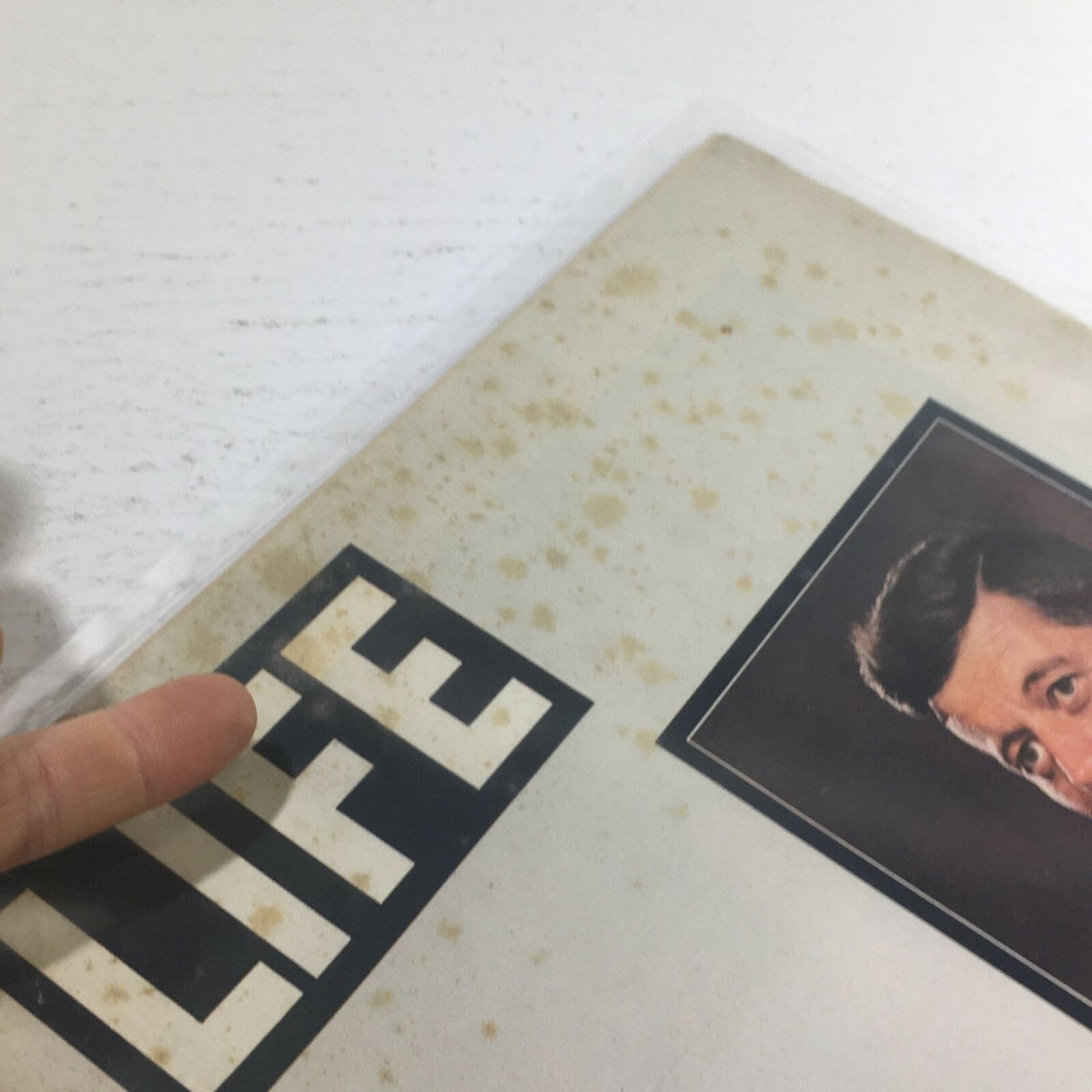 Detail view of the cover of the 1963 VTG Life Magazine: John F. Kennedy Memorial Edition, showing the iconic LIFE logo with some signs of aging and wear.