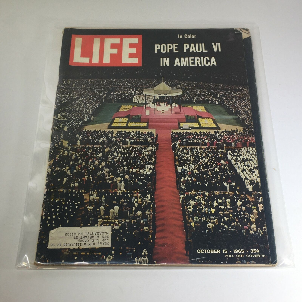 Vintage Life Magazine Cover from October 15, 1965 featuring Pope Paul VI in America with a vibrant crowd captured during his historic visit.