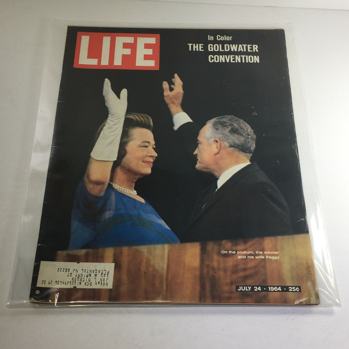 VTG Life Magazine: July 24, 1964, featuring the Goldwater Convention. Cover image includes a woman in an elegant blue dress and gloves waving, alongside a man in a suit. In-color photograph on the cover highlights a significant political event.