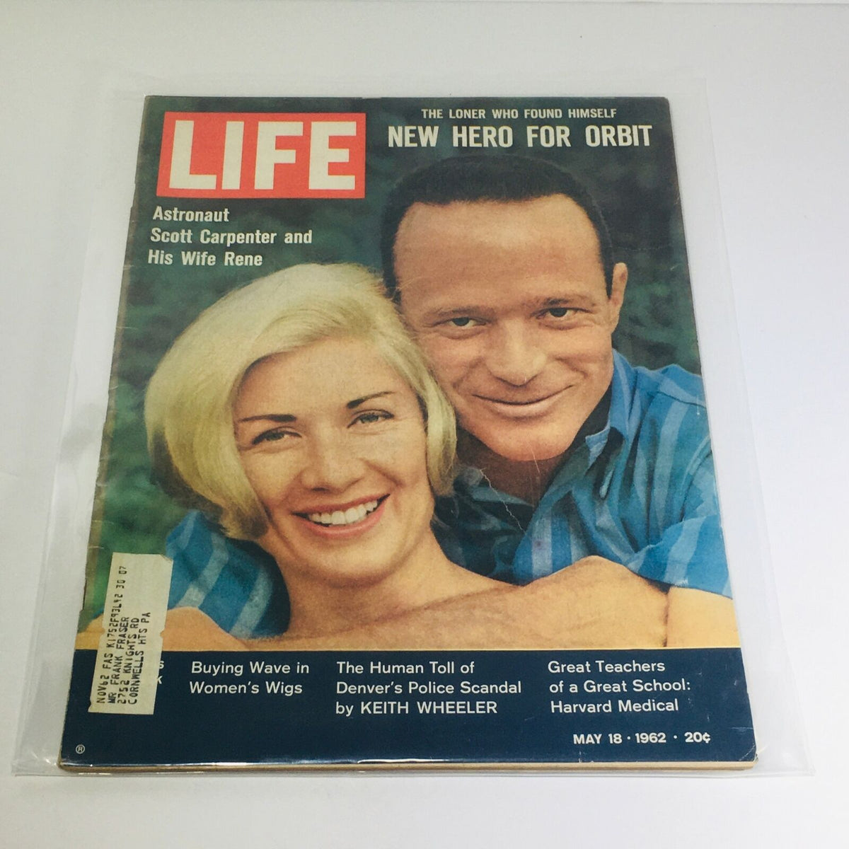 Vintage Life Magazine cover from May 18, 1962 featuring astronaut Scott Carpenter and his wife, Rene. The magazine showcases the theme 'New Hero for Orbit' with vibrant imagery reflecting the early space race era.