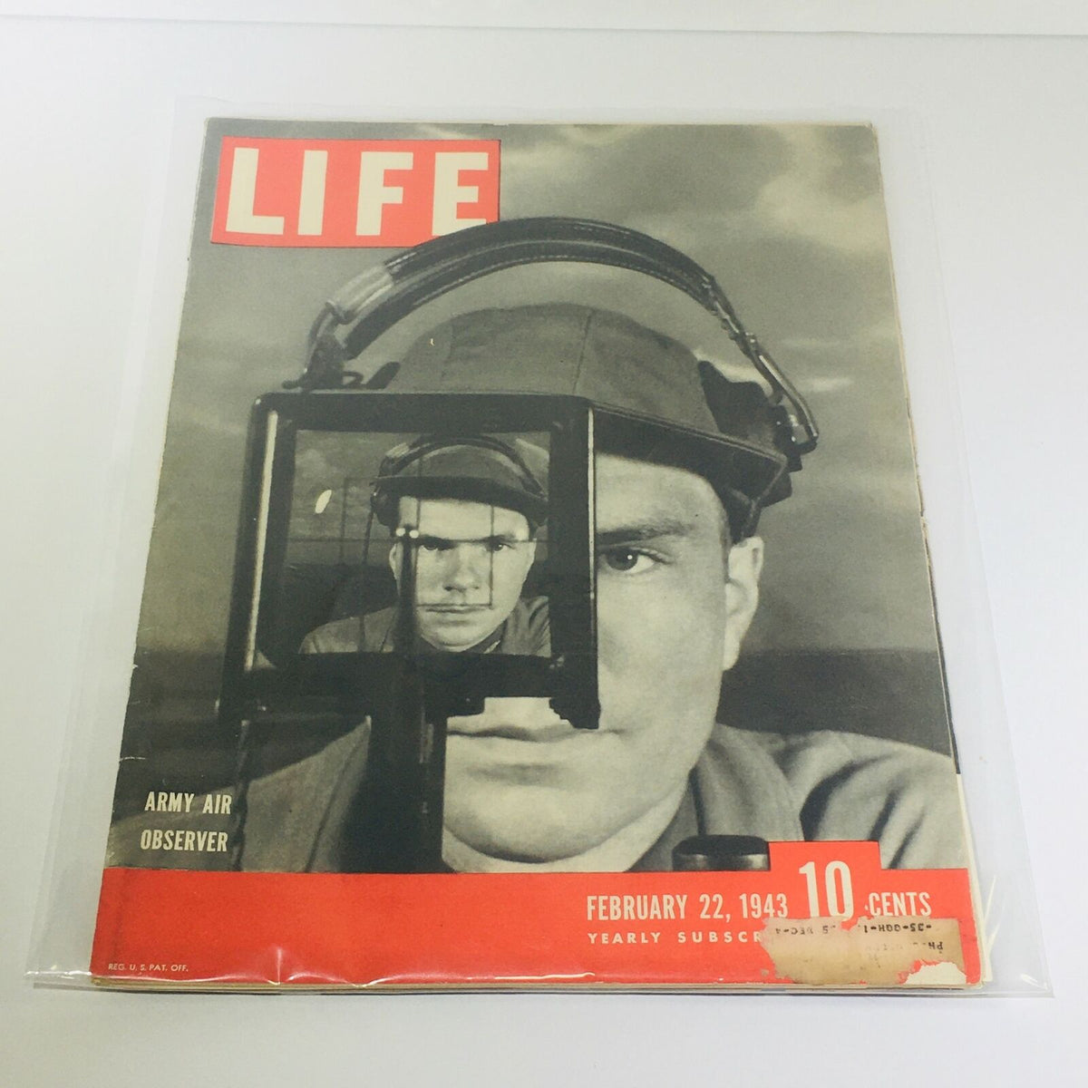 VTG Life Magazine Cover from February 22, 1943 featuring the Army Air Observer during WWII, showcasing a soldier looking through a gun sight, emphasizing military aviation history.