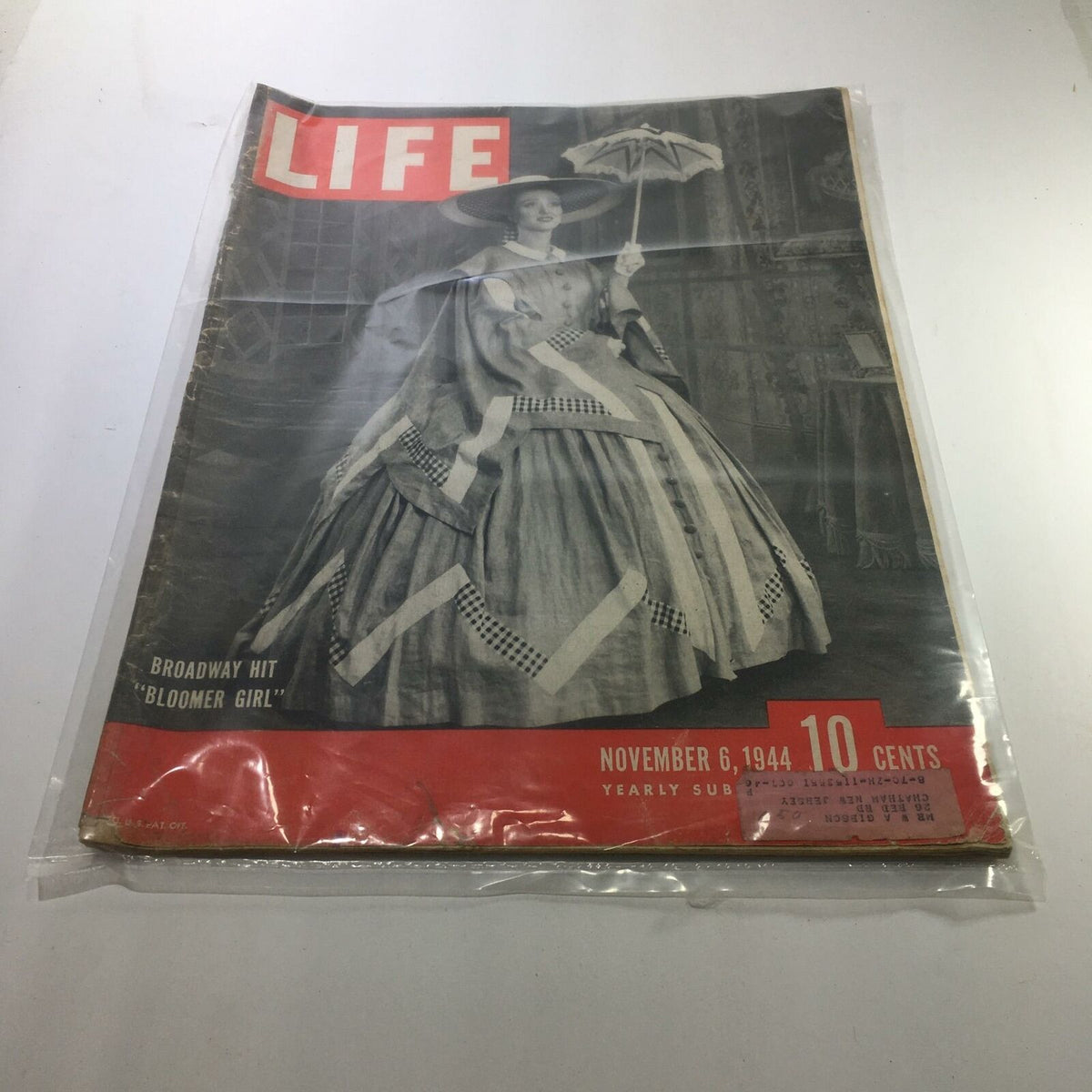 Vintage Life Magazine from November 6, 1944, featuring the Broadway hit 'Bloomer Girl'. The cover showcases a woman in a historical dress holding a parasol, emphasizing classic Americana and theater history.