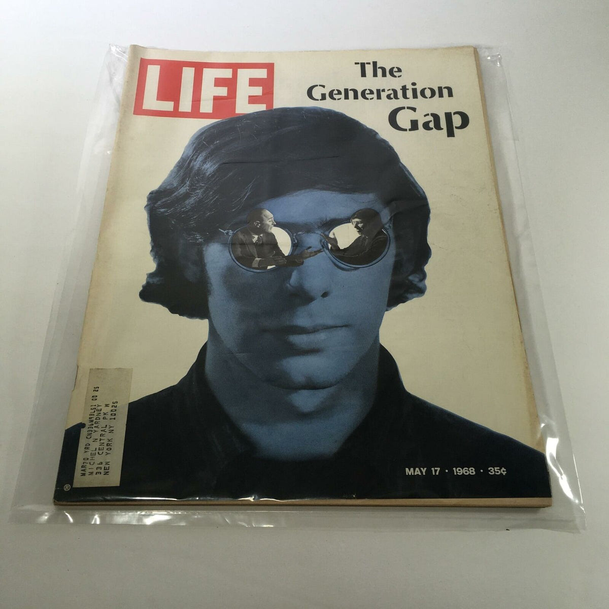 Vintage Life Magazine cover from May 17, 1968 titled 'The Generation Gap', showcasing a thought-provoking design featuring a man with sunglasses reflecting two individuals in discussion.