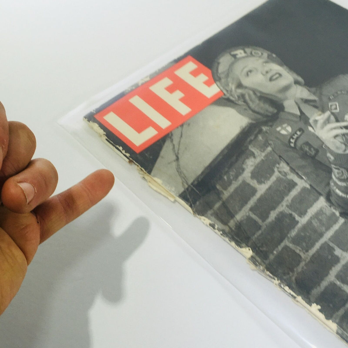 Close-up view of a vintage LIFE magazine cover from November 27, 1944, featuring Gertrude Lawrence. The image shows the magazine's edges and the protective plastic covering, highlighting its collectible nature.
