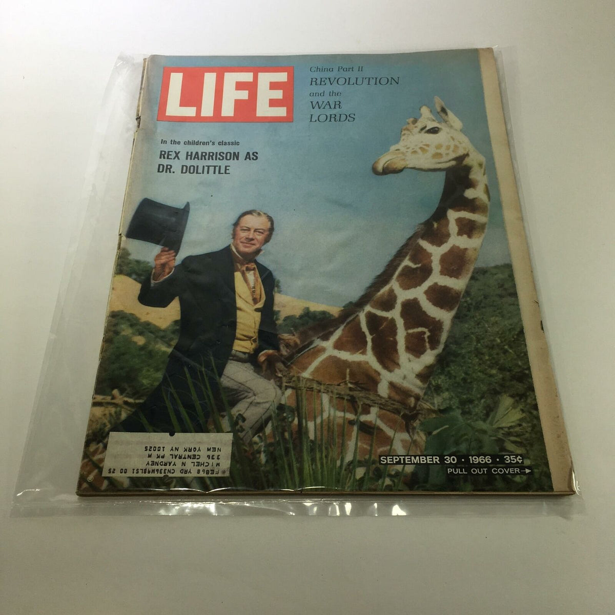 Vintage Life Magazine from September 30, 1966 featuring Rex Harrison as Dr. Dolittle, showcasing a colorful cover with a giraffe, perfect for collectors of cinematic history.
