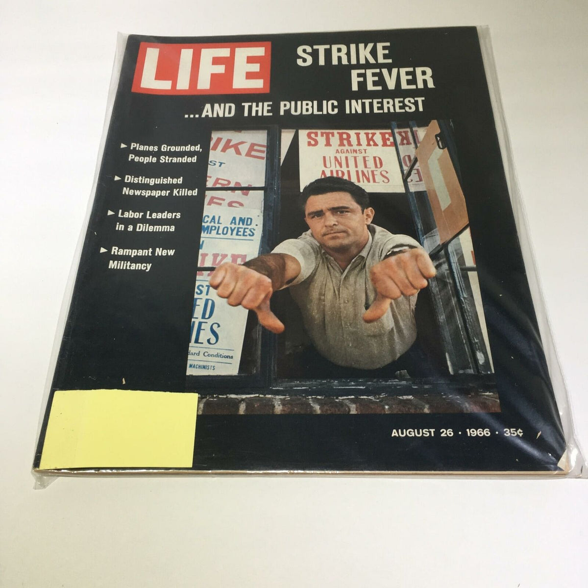 Cover of the VTG Life Magazine dated August 26, 1966, titled 'Strike Fever and The Public Interest', showcasing a man with a thumbs down gesture, reflecting labor unrest, with headlines about strikes and public issues.