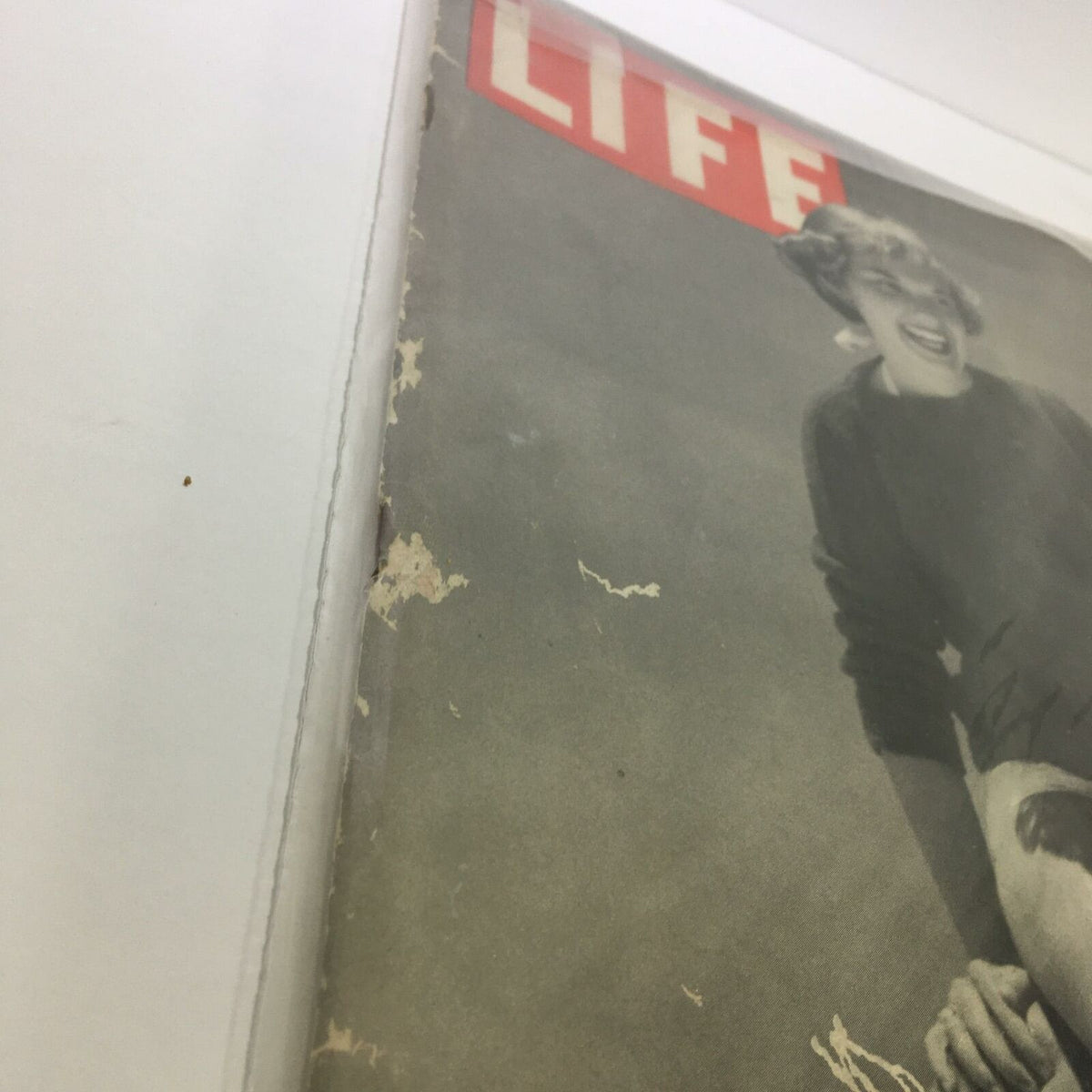 Side angle of Life Magazine, April 26, 1948, showcasing the iconic 'LIFE' logo and aged edges, reflecting its historical significance and collectible nature.