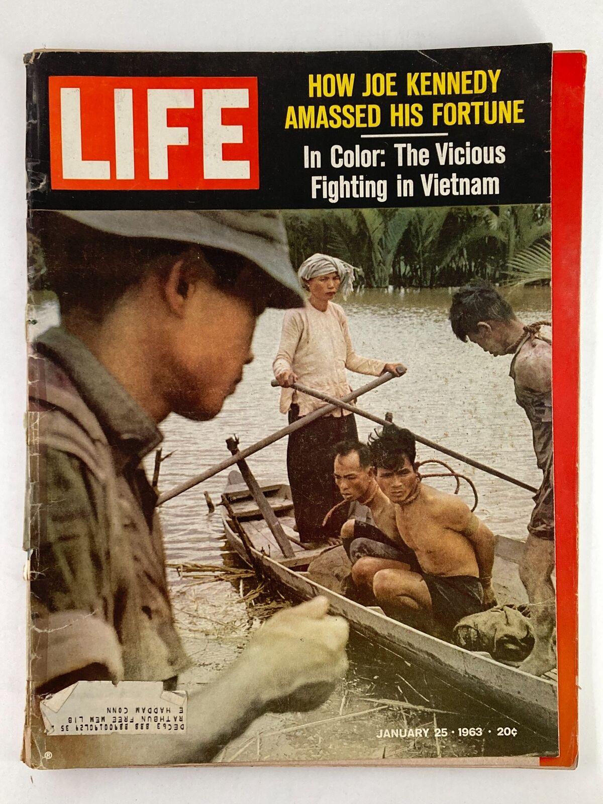 Cover of Life Magazine dated January 25, 1963, featuring the title 'How Joe Kennedy Amassed His Fortune' along with a dramatic photograph related to the Vietnam conflict.