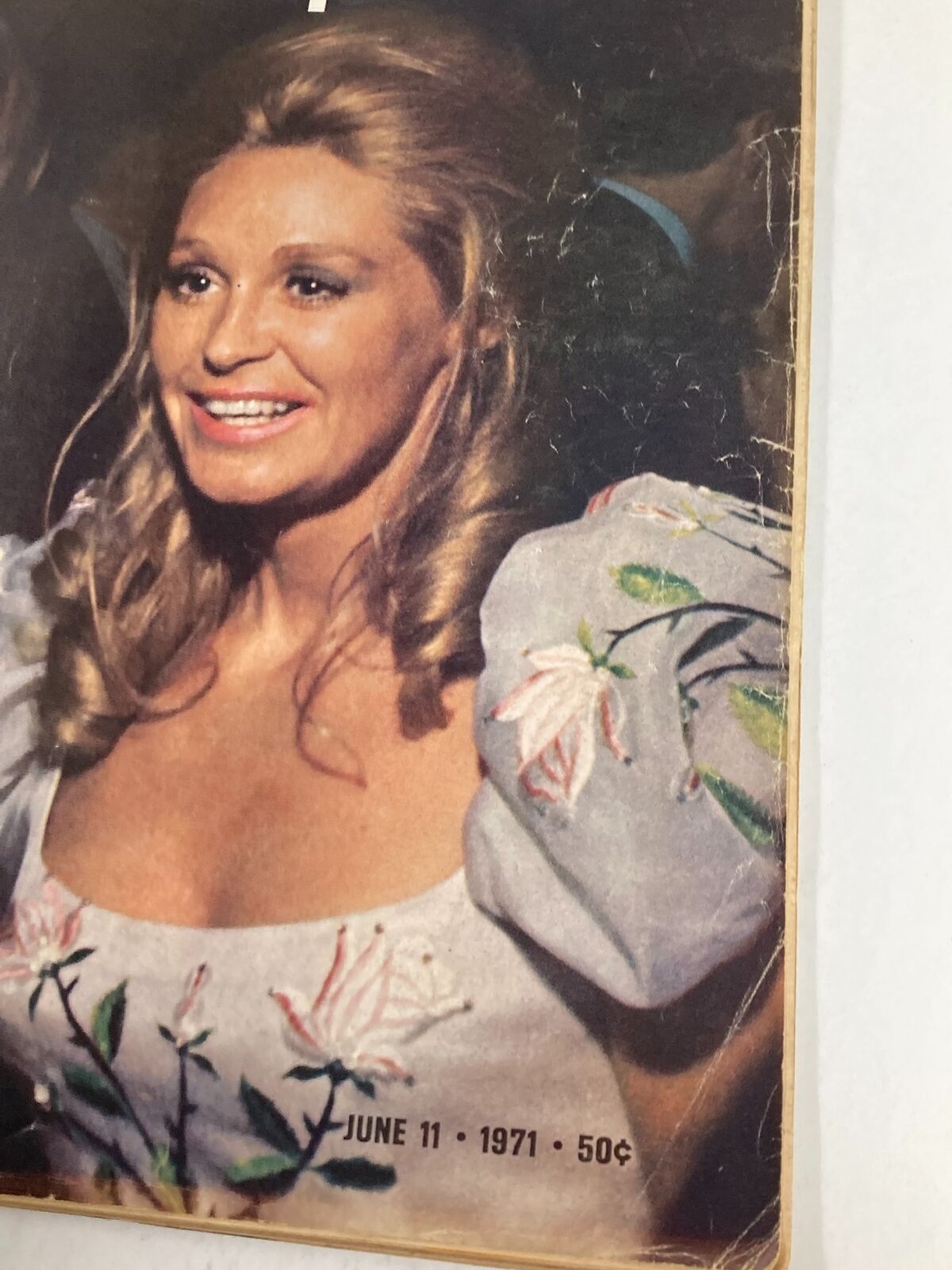 Close-up of a woman smiling at a party featured in VTG Life Magazine June 11 1971 Ted and Joan Kennedy at the Party, showcasing vintage fashion and beauty of the early 70s.
