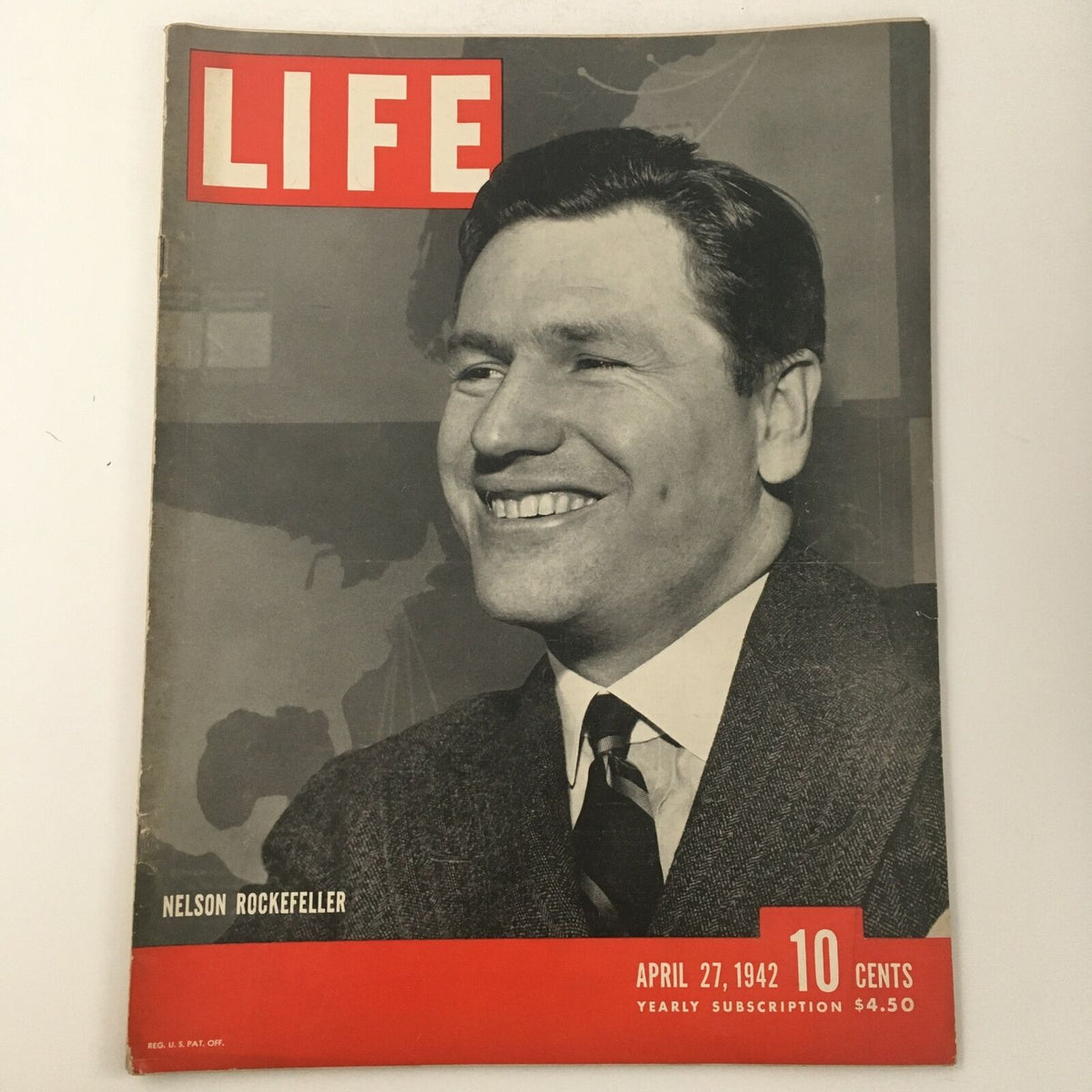 Cover of Life Magazine, April 27, 1942, featuring a photograph of businessman Nelson Rockefeller, showcasing the historical context and significance of American business during World War II.
