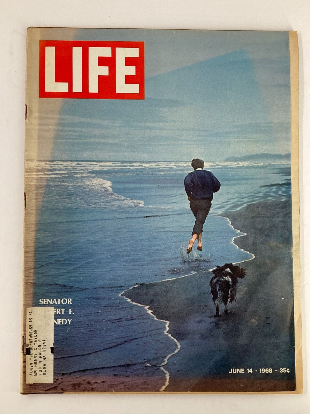 VTG Life Magazine cover from June 14, 1968, featuring Senator Robert F. Kennedy running along a beach with his dog, capturing a nostalgic moment in American history.