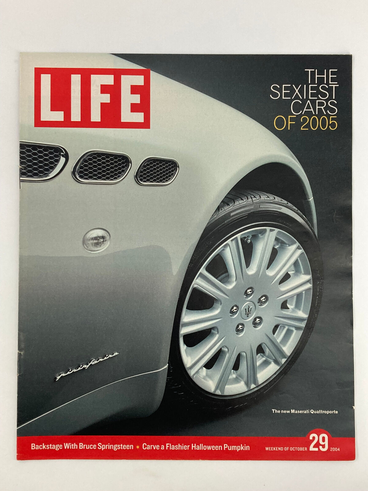 Life Magazine insert featuring the Maserati Quattroporte, showcasing the vehicle's luxury design and style, dated October 29, 2004.