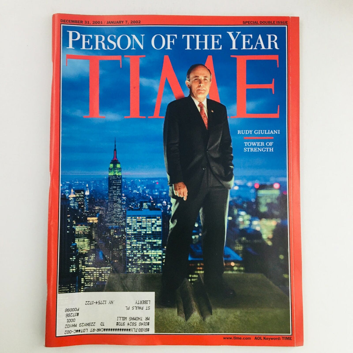 Time Magazine December 31, 2001 edition featuring Mayor Rudy Giuliani on the cover titled 'Tower of Strength', showcasing him in a suit against a New York City skyline backdrop.