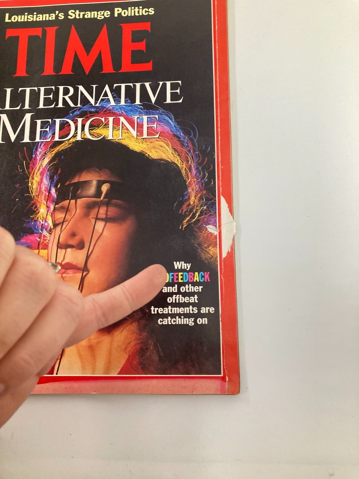 Detailed view of the vintage Time Magazine cover, dated November 4, 1991, highlighting the text 'Why BIOFEEDBACK and other offbeat treatments are catching on' alongside a woman experiencing a biofeedback session.