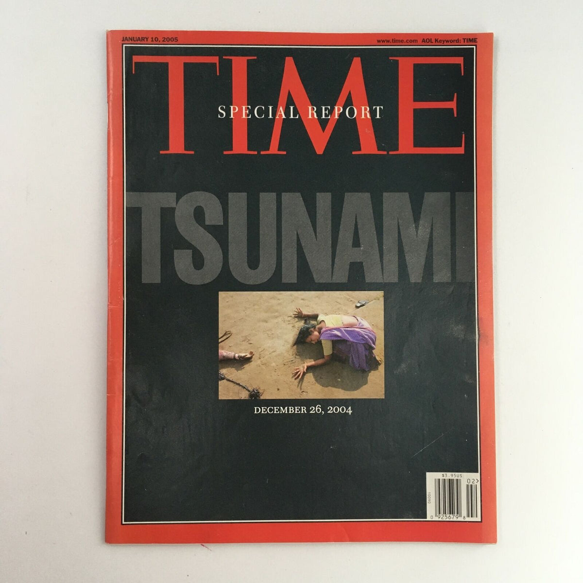 Cover of Time Magazine January 10 2005, Vol 165 #1, featuring a special report on the tsunami with a poignant image reflecting the impact of the disaster.