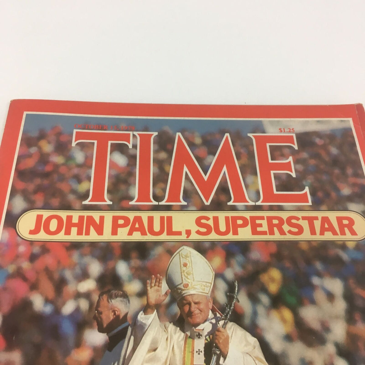 Close-up of the Time Magazine title 'John Paul Superstar' dated October 15, 1979, showcasing Pope John Paul II.