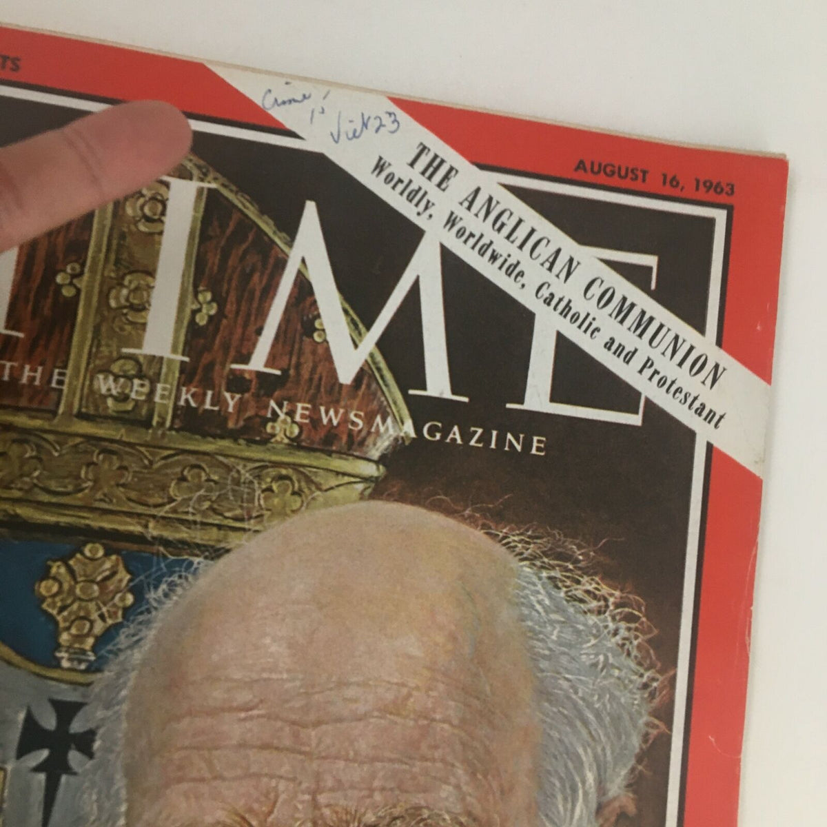 Close-up of Time Magazine cover from August 16, 1963, featuring the title 'Time Magazine August 16 1963 Vol. 82 No. 7 Archbishop Michael Ramsey' with handwritten notes and details about the Anglican Communion.