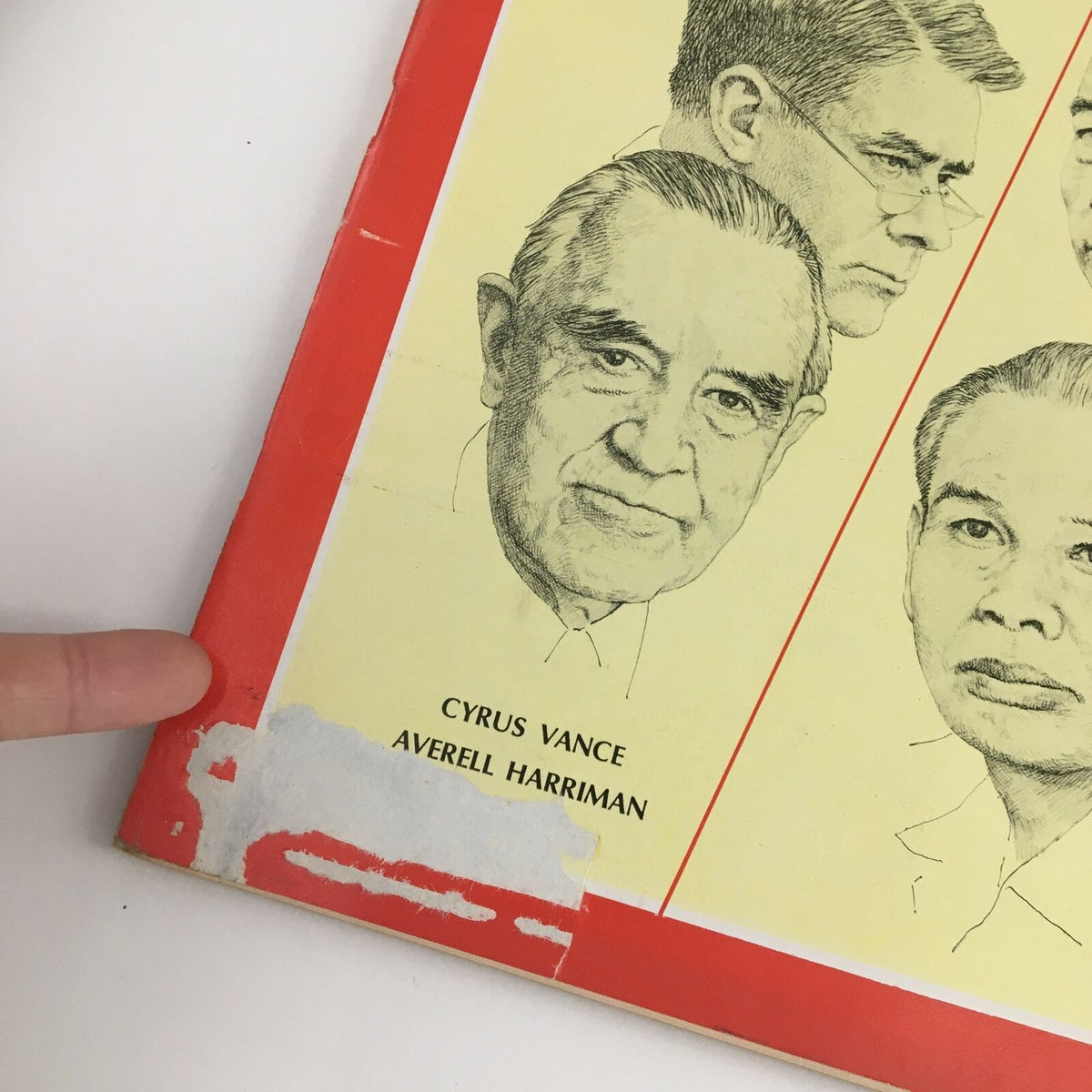Close-up of Time Magazine May 10 1968 Cover showing the names Cyrus Vance and Averell Harriman with visible wear on the magazine.