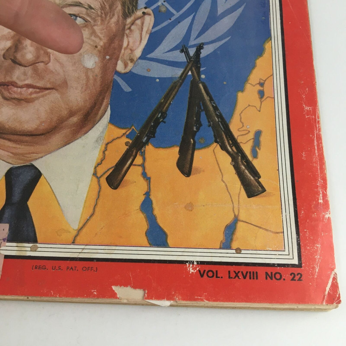 Detail of the Time Magazine November 26 1956 cover displaying the volume number and the United Nations theme, featuring a vintage illustration.