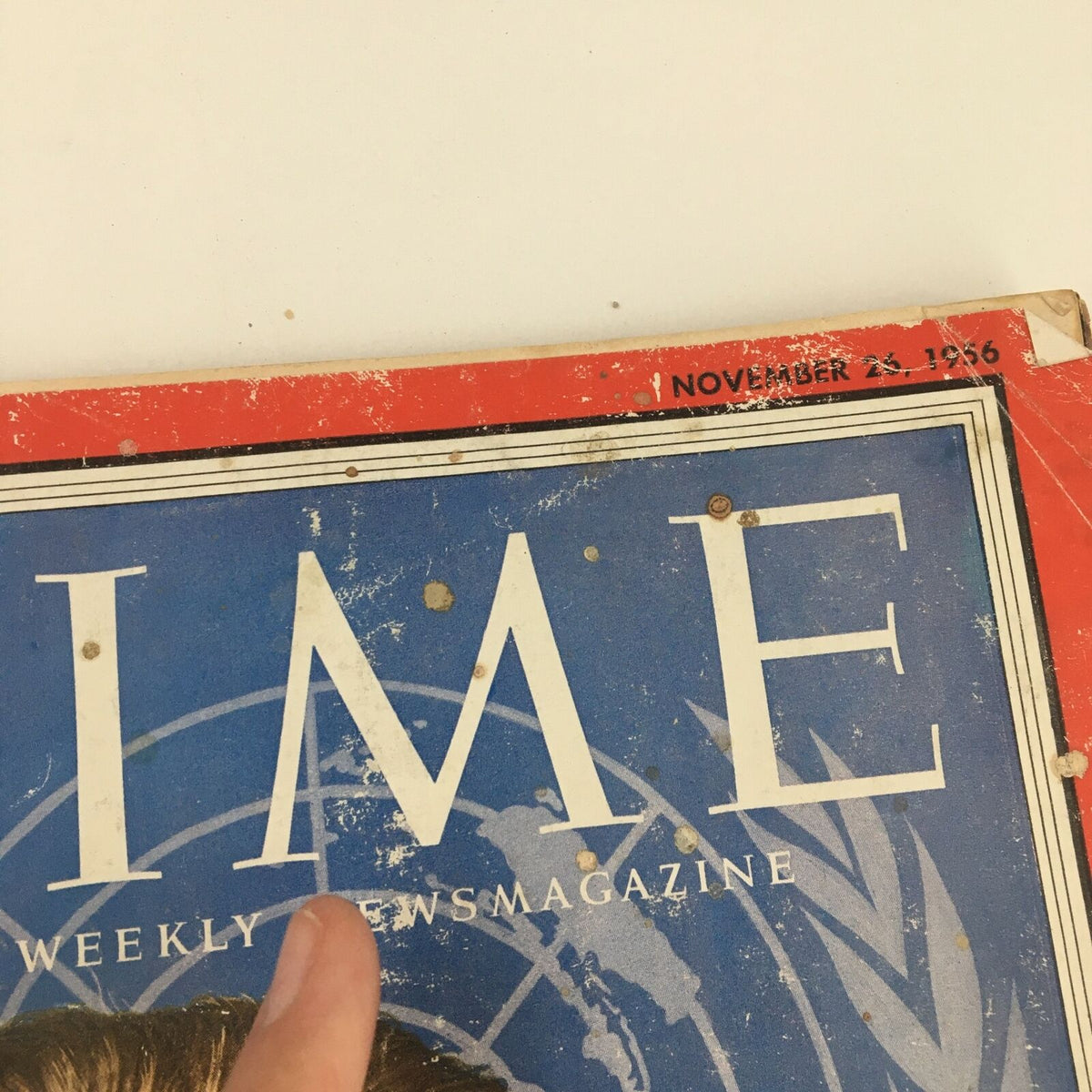 Time Magazine November 26 1956 cover with visible imperfections, showcasing the historical significance of the issue featuring Dag Hammarskjöld.