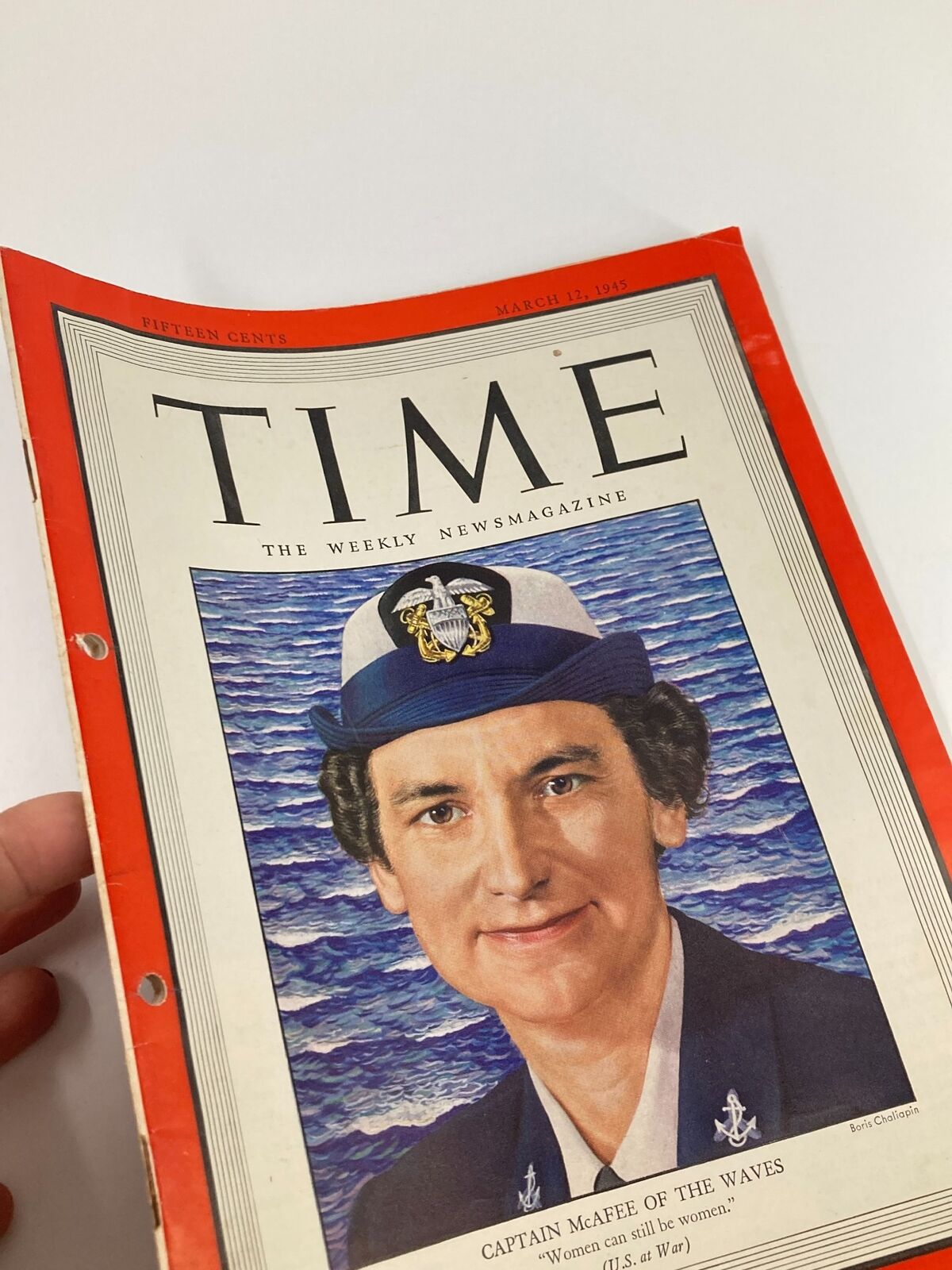 Close-up view of the Vintage Time Magazine March 12, 1945 cover highlighting Captain McAfee Of The Waves, with the quote about women in service.
