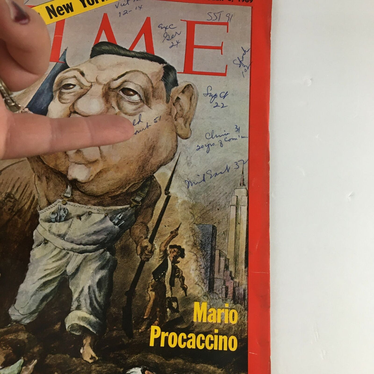Another angle of the Time Magazine cover from October 3, 1969, displaying 'The Battle for New York' with caricature of Mario Procaccino and visible handwritten notes, emphasizing its vintage character.