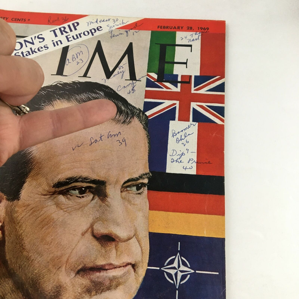 Detailed view of Time Magazine February 28, 1969 cover highlighting Richard Nixon, the headline 'Nixon's Trip - The Stakes in Europe', and visible handwritten annotations.