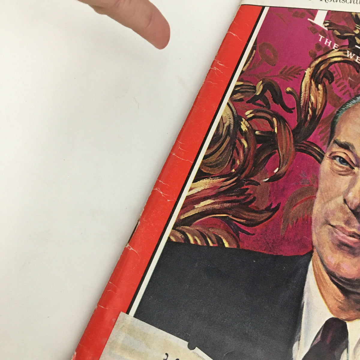 Close-up view of the spine of Time Magazine December 20 1963, showcasing the title The Guy de Rothschild Today, Volume 82, Number 25, with visible wear on the cover.