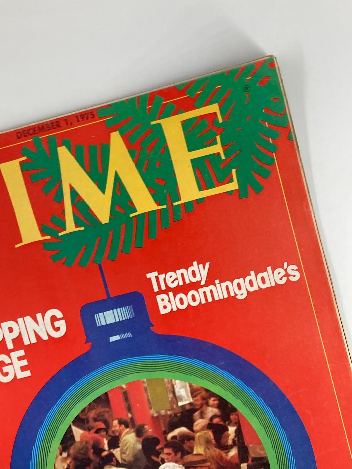 Close-up view of the cover of VTG Time Magazine December 1 1975, highlighting the text 'U.S. Shopping Surge' and 'Trendy Bloomingdale's' with festive design elements.