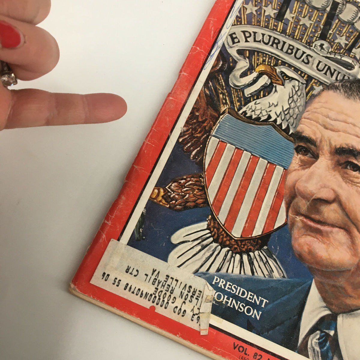 Close-up of the cover of VTG Time Magazine November 29 1963 highlighting President Lyndon B. Johnson's image, with visible wear and a label affixed, emphasizing its vintage charm.