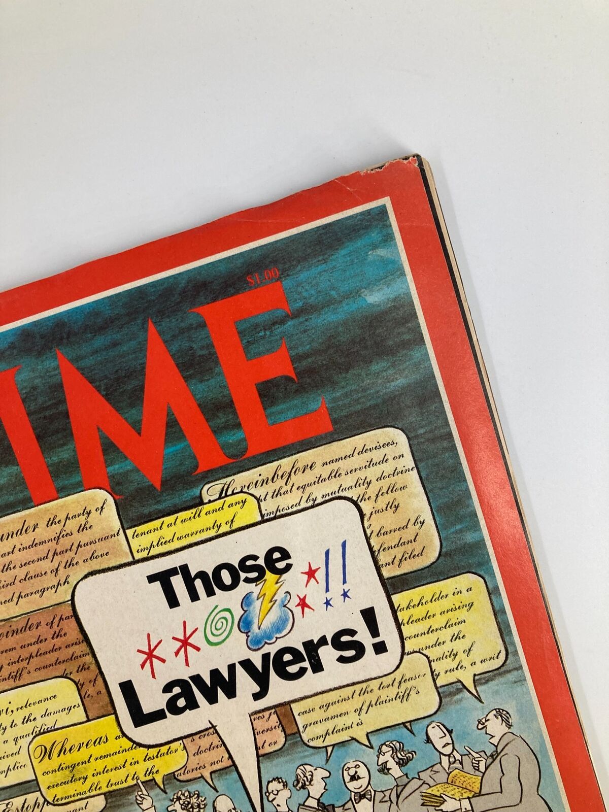 Close-up shot of the vintage Time Magazine cover from April 10, 1978, showing the title 'Those Cursed Words Lawyers!' with a vibrant design and cartoonish elements.