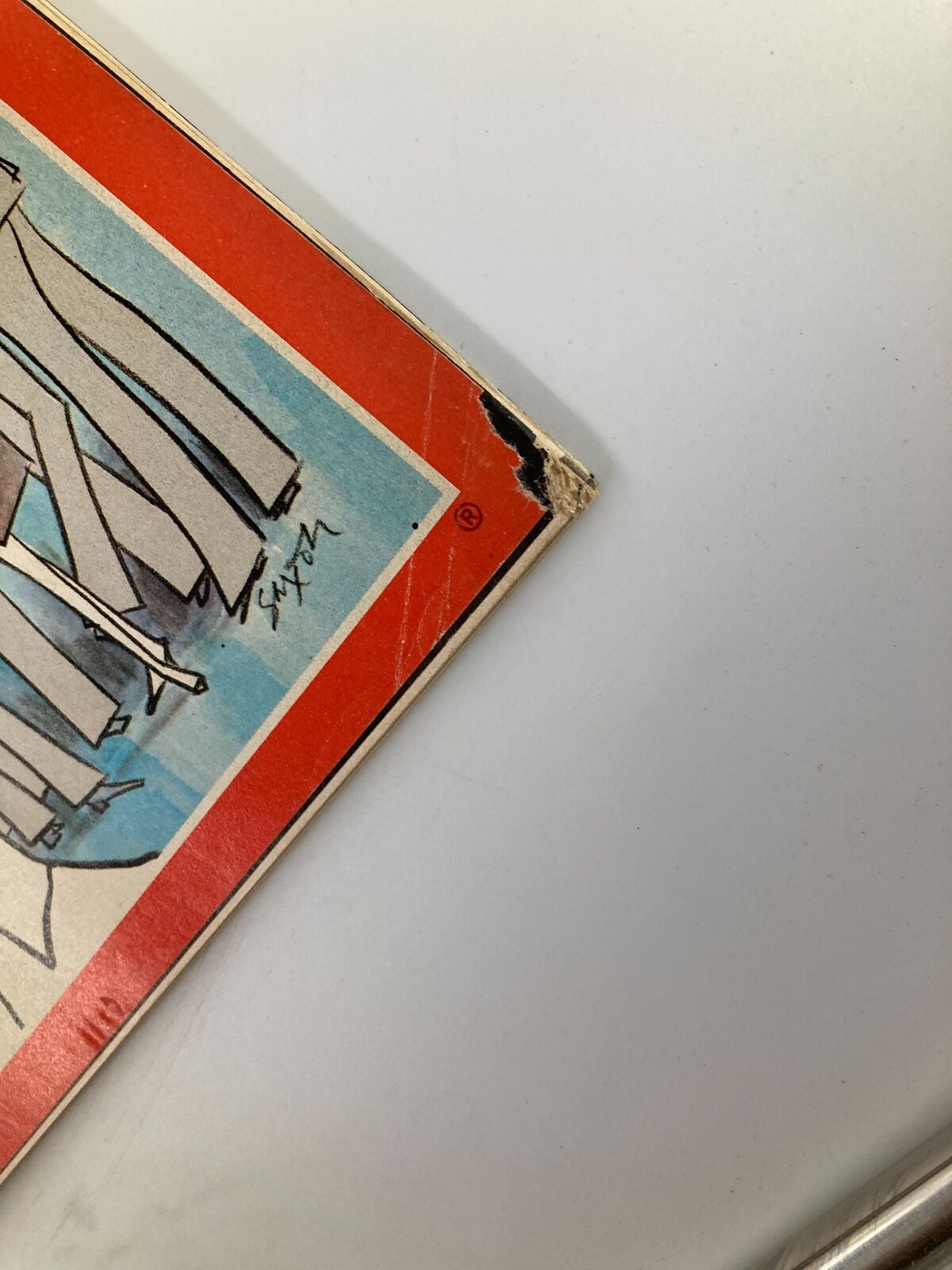 Detailed view of the corner of the vintage Time Magazine from April 10, 1978, highlighting wear and tear, with the title 'Those Cursed Words Lawyers!' prominently displayed.