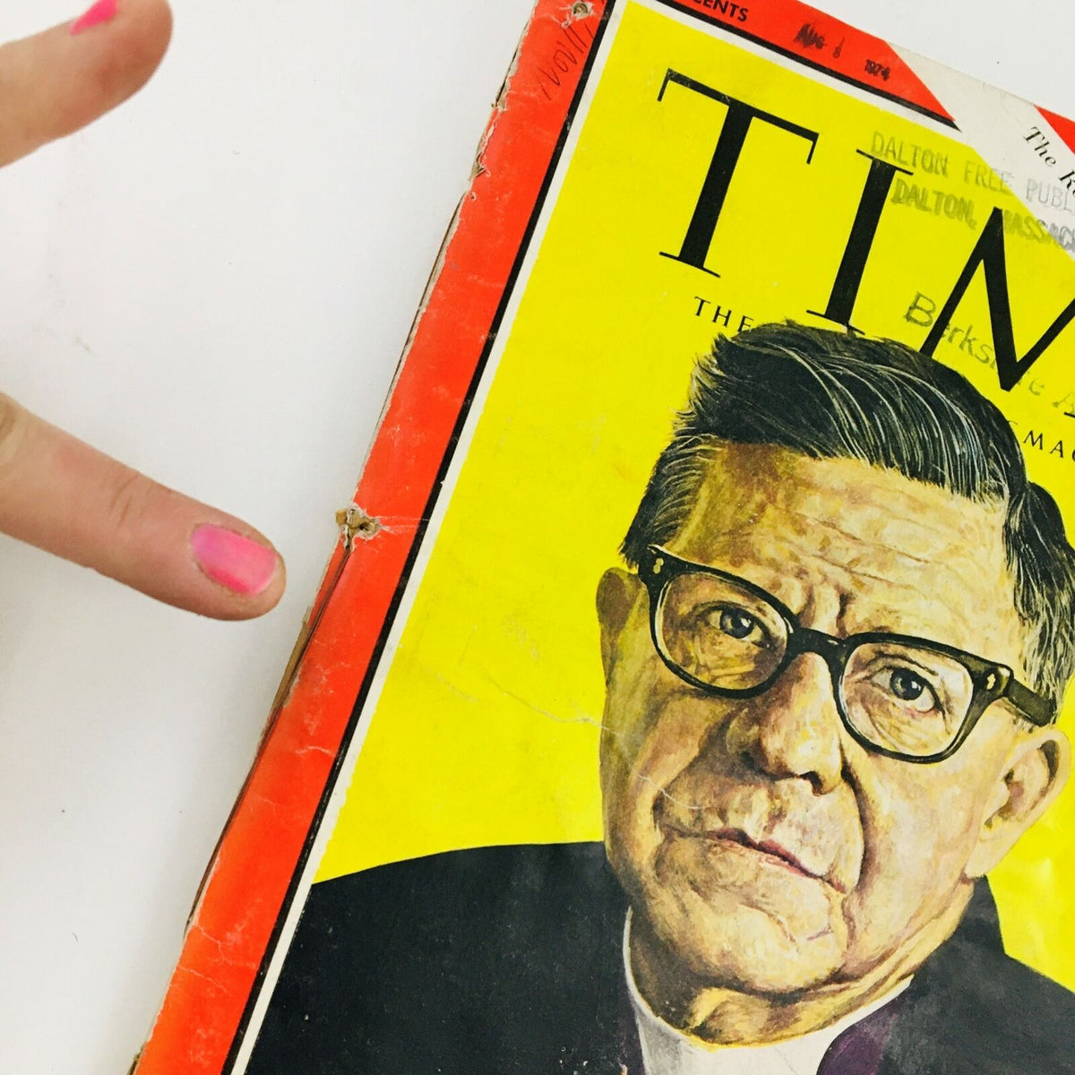 Close-up of Time Magazine cover from November 11, 1966, highlighting imperfections and wear, including a tear and a finger pointing at the cover. This edition features Episcopal Bishop James Albert Pike, Vol 88 #20, and reflects the magazine's historical significance.