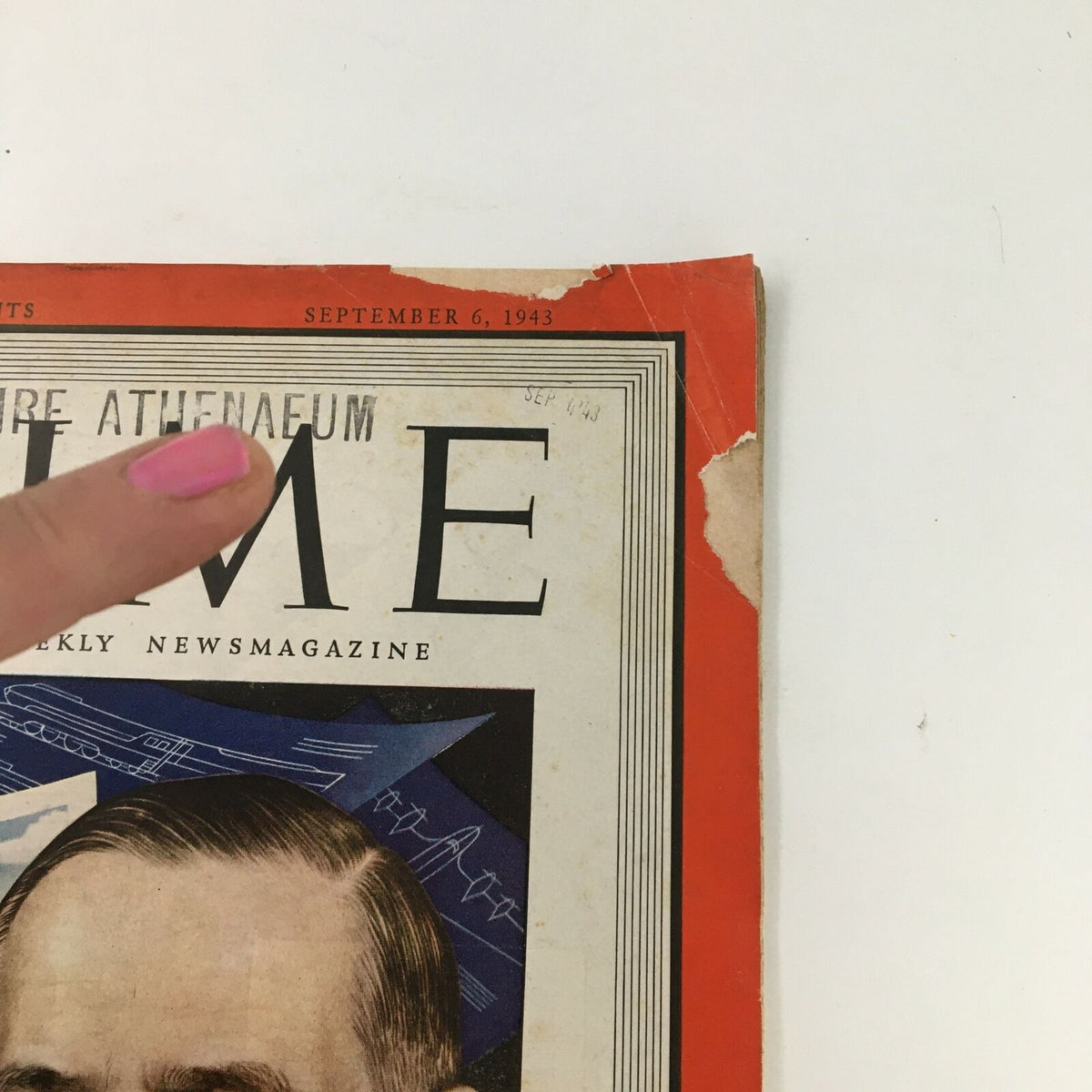 Close-up of the Time Magazine cover from September 6, 1943, displaying the edition's title and date, with visible wear and historical markings.