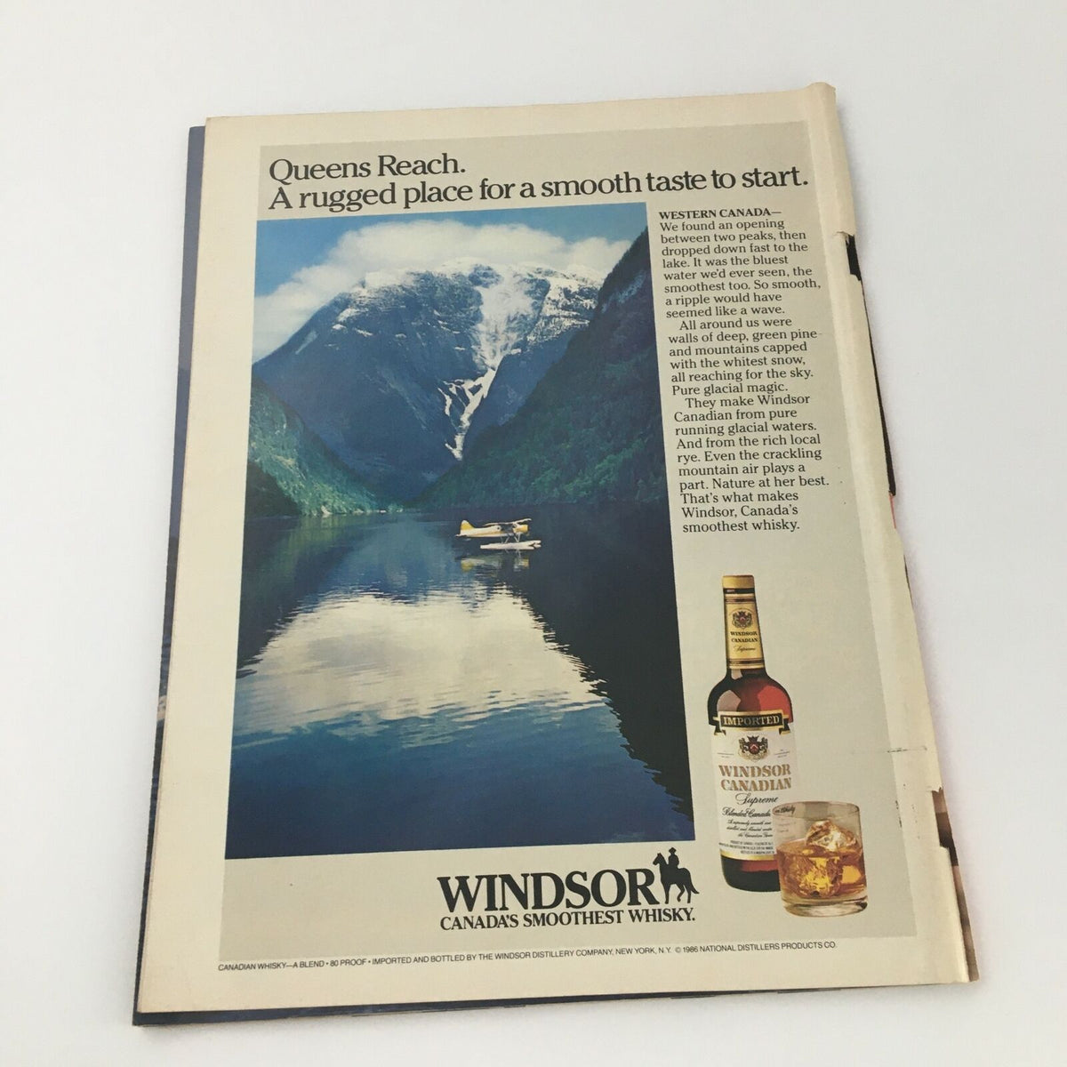 Back cover of the VTG Time Magazine September 8, 1986 featuring an advertisement for Windsor Canadian whisky with a scenic Canadian background.