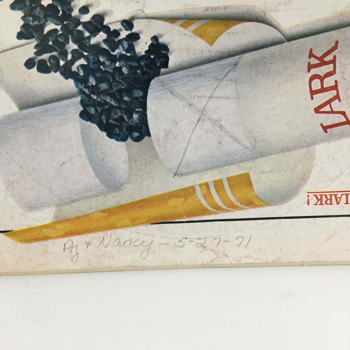 Close view of the Lark Filter Cigarettes advertisement on the back of Time Magazine from September 11, 1964, with handwritten notes.