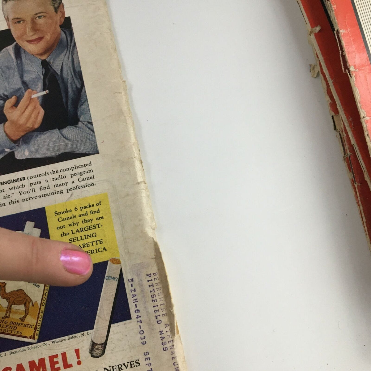 Detail of Camel cigarette advertisement from Time Magazine December 19 1938, highlighting the largest selling cigarette in America.