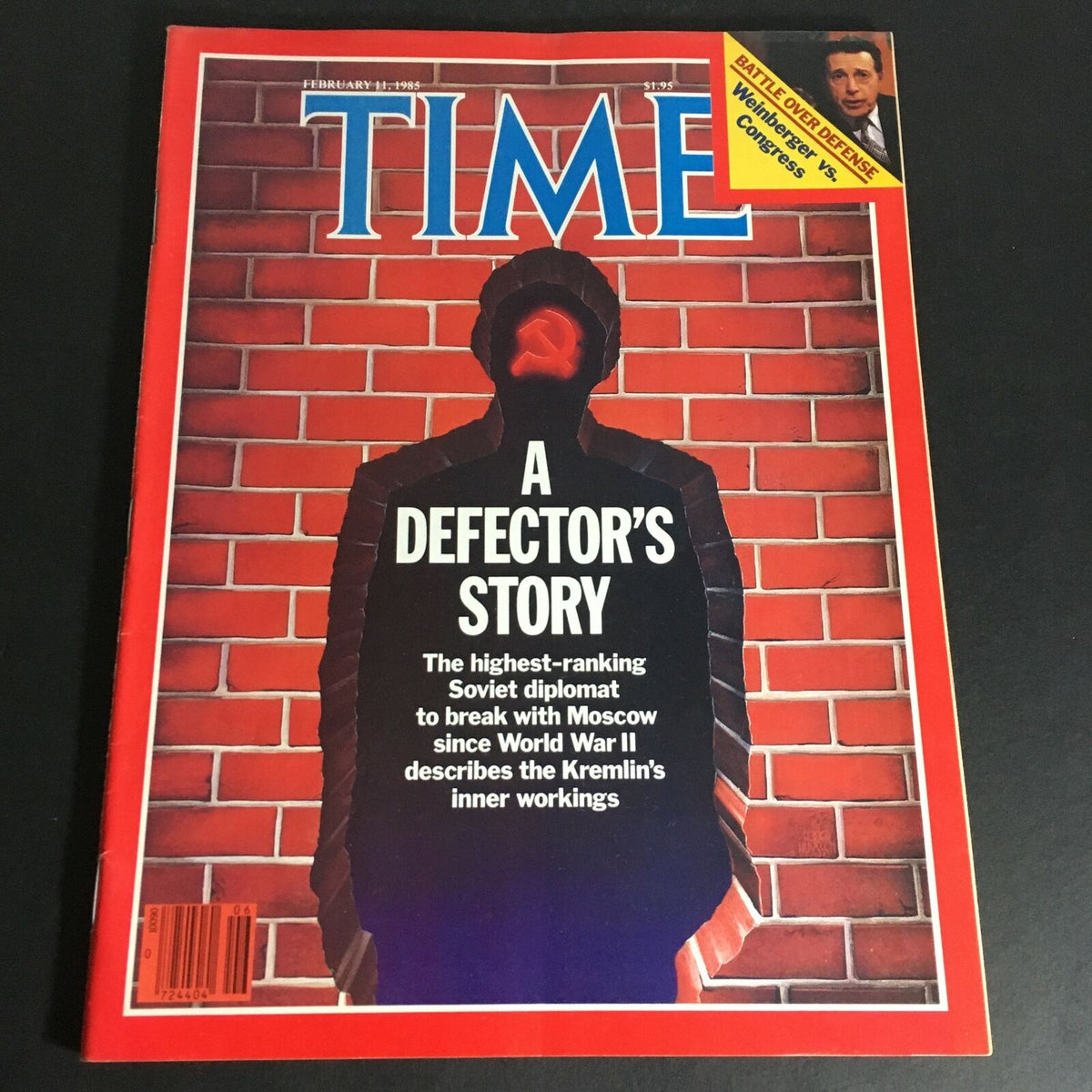 Front cover of Time Magazine, February 11, 1985, featuring the title 'A Defector's Story' with an illustration of a silhouette against a brick wall, highlighting a story about a high-ranking Soviet diplomat's defection.