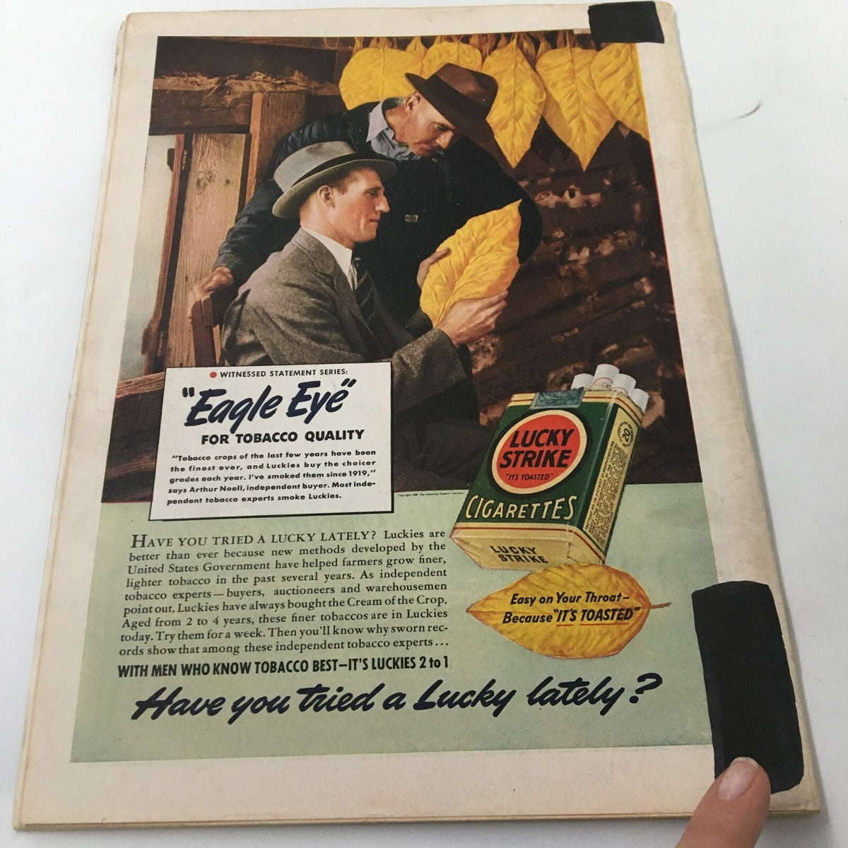 Vintage advertisement from the July 10, 1939 issue of VTG Time Magazine, featuring 'Eagle Eye' for tobacco quality, showcasing two men handling tobacco leaves with a Lucky Strike cigarette package, highlighting the historical context of tobacco advertising.