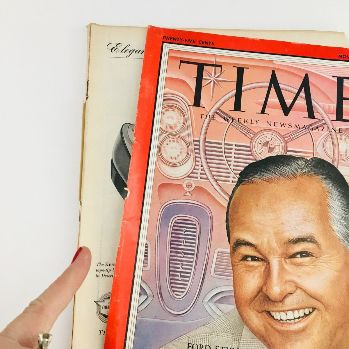 Time Magazine from November 4, 1957, partially revealed, highlighting Ford Stylist George Walker on the cover with vibrant 1950s design elements.
