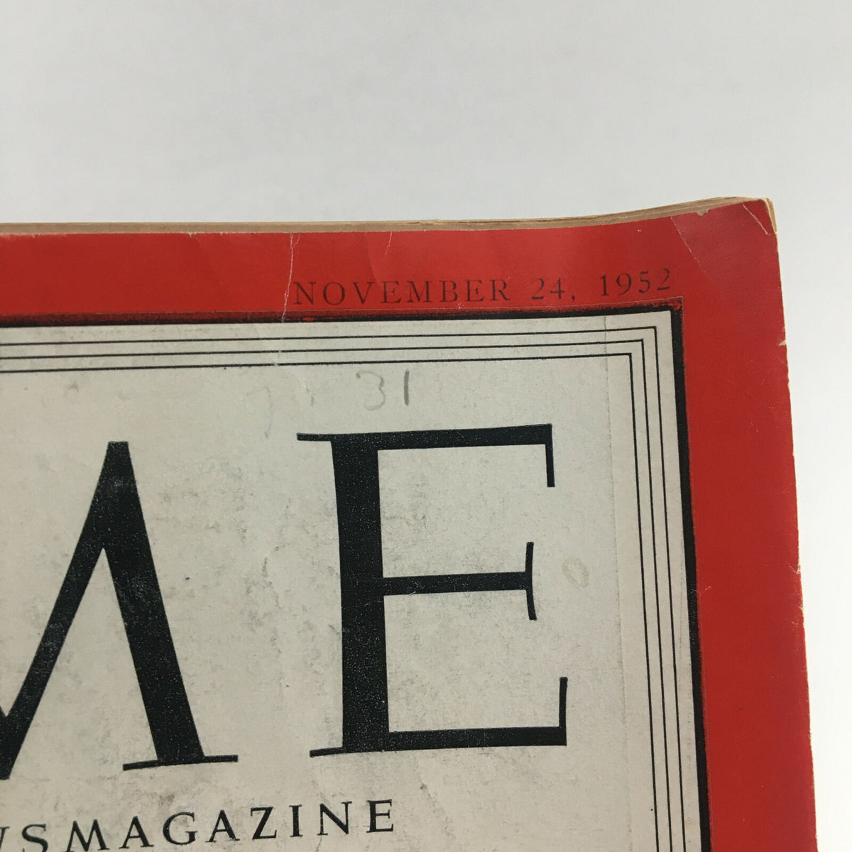 Top view of Time Magazine dated November 24, 1952, highlighting the publication date and iconic logo.