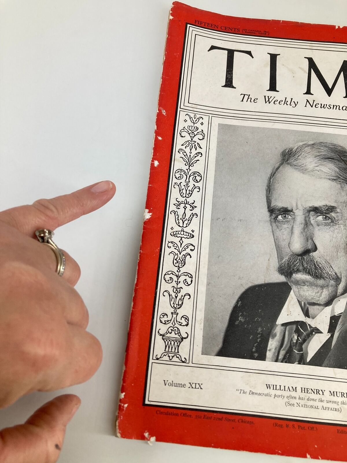 Close-up view of the cover of VTG Time Magazine February 29 1932 with William Henry Murray, pointing at the wear on the magazine's edge, illustrating its vintage condition.