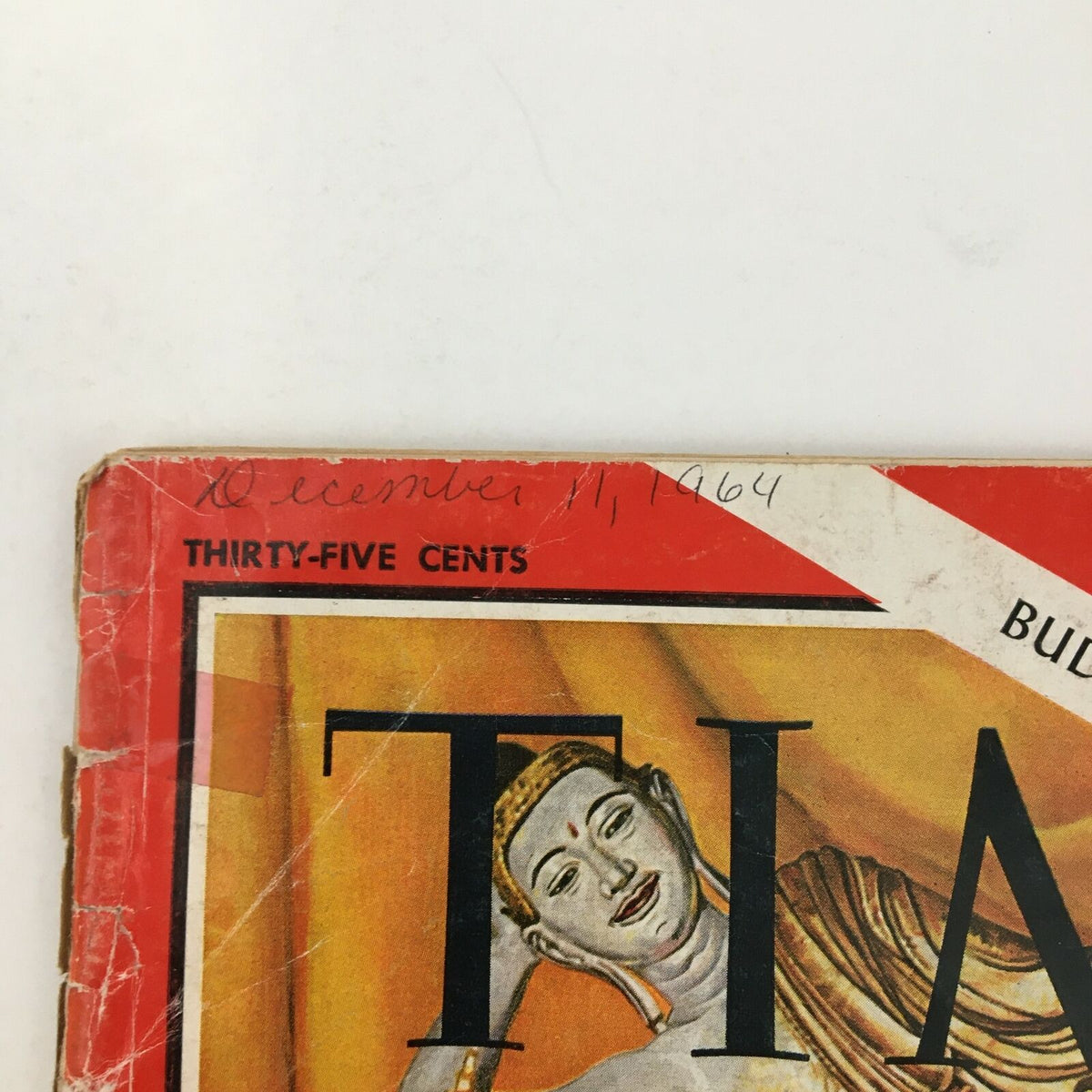 Top of Time Magazine December 11 1964 with handwritten date and price, focusing on the theme of Buddhism and politics.