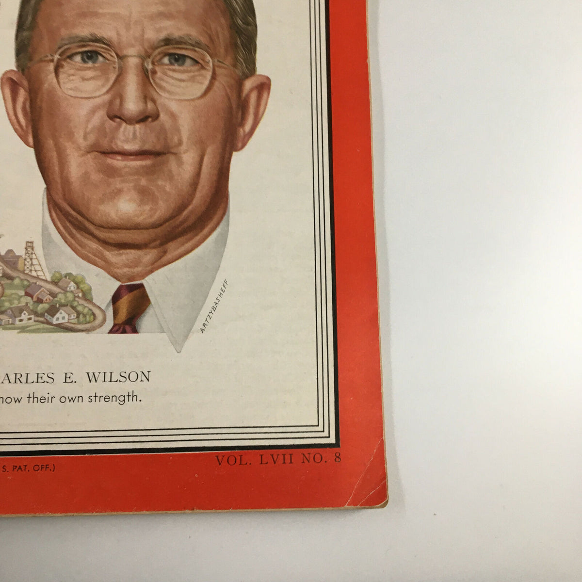 Detailed image of the lower section of the VTG Time Magazine Cover from February 19, 1951, showcasing Charles E. Wilson and the inscription emphasizing American strength.